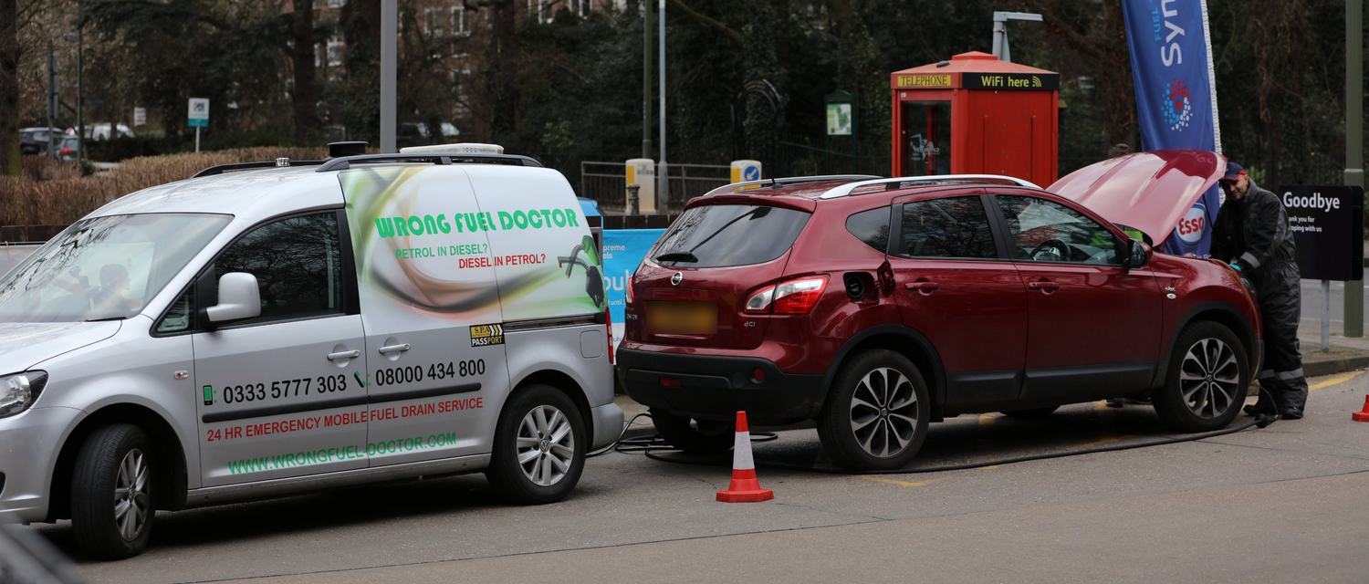 Wrong Fuel Doctor technician draining petrol from a diesel car in Congleton Edge