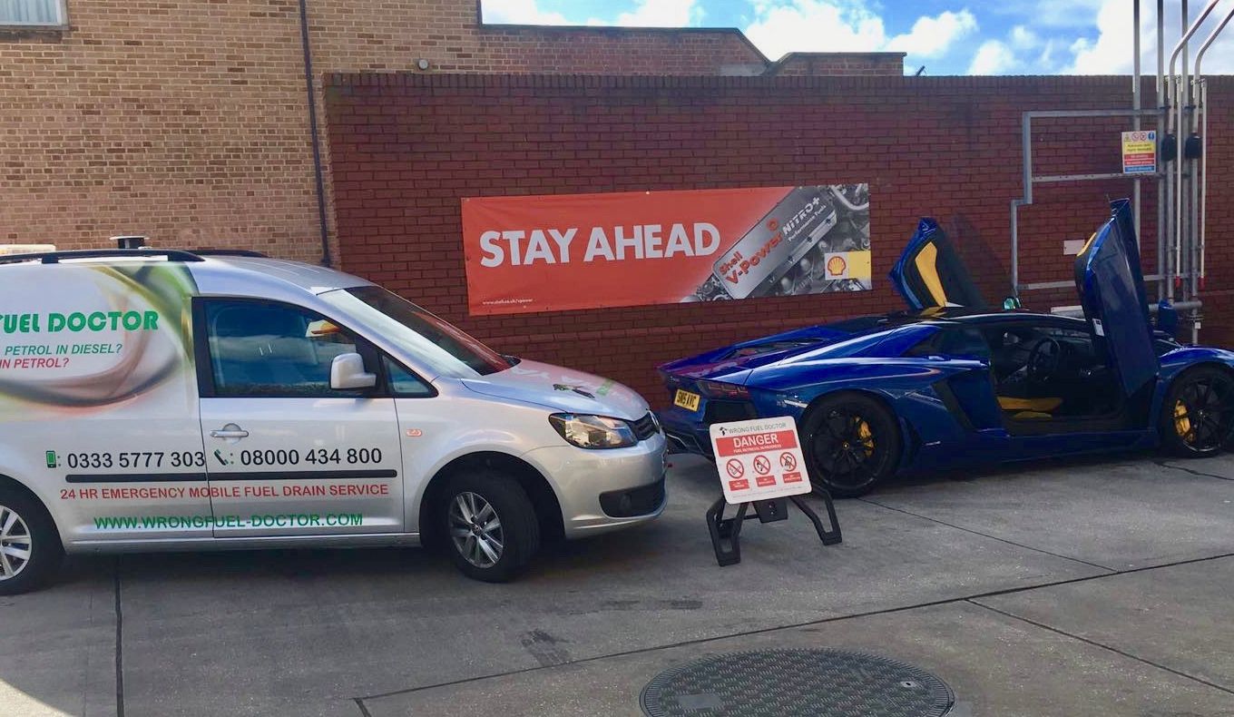Wrong Fuel Doctor technician draining petrol from a diesel car in Kermincham